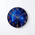 A round wall clock with a dark blue geometric starry pattern face and glowing orange numerals and hands, shown against a plain white background.