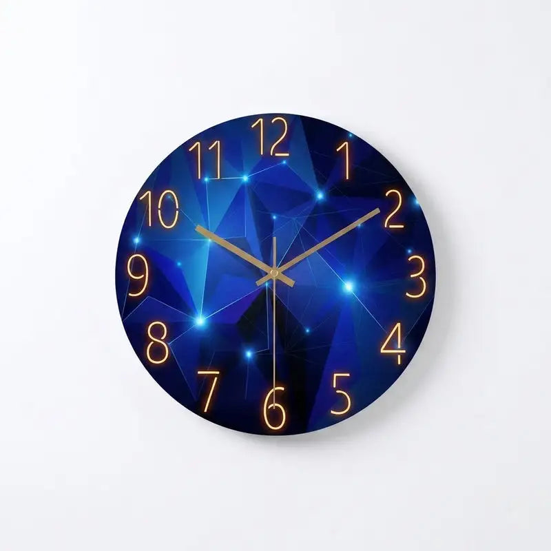 A round wall clock with a dark blue geometric starry pattern face and glowing orange numerals and hands, shown against a plain white background.